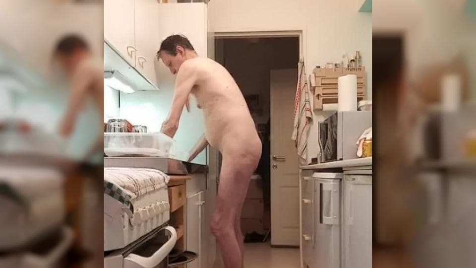 Grandpa washes his dishes naked