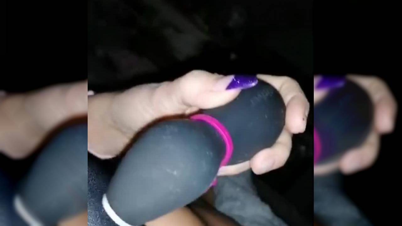 Using a sextoy to make herself wet and juicy