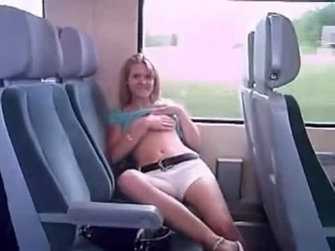 Blonde shows off her hot body in the train