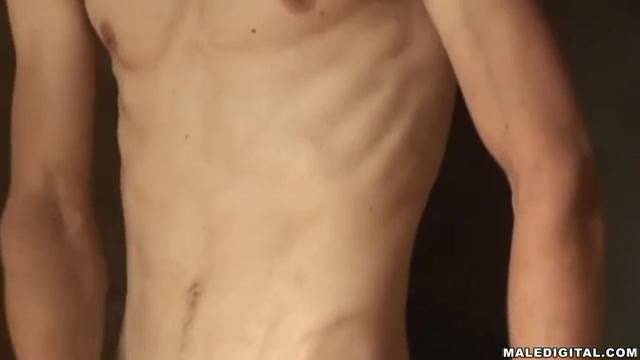 This skinny muscular guy has his dick in hand