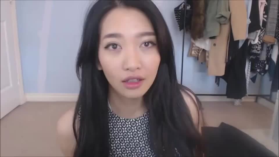 A young Asian babe enjoys fucking her toy