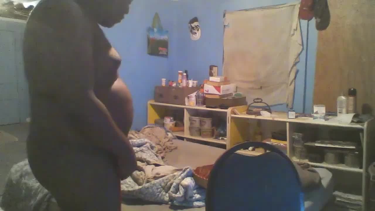 Big black jerks off in his messy room