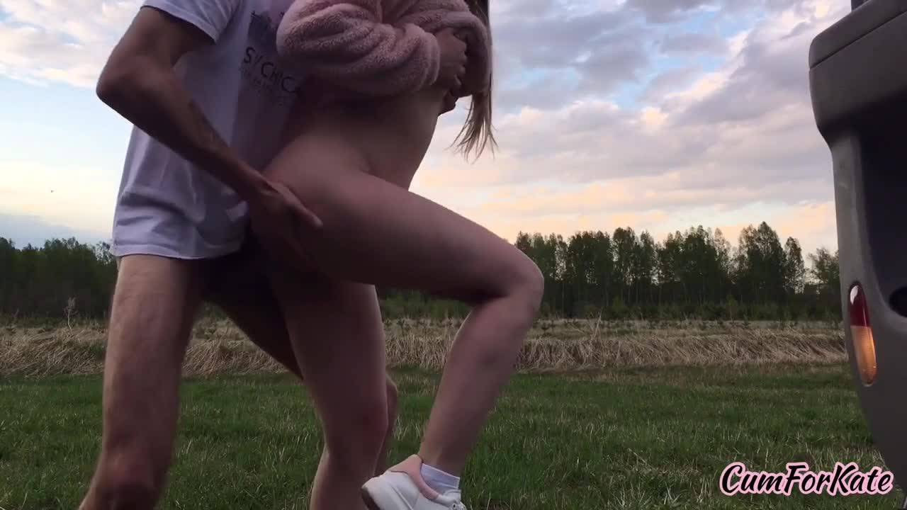 Outside and fucking her in the middle of a field