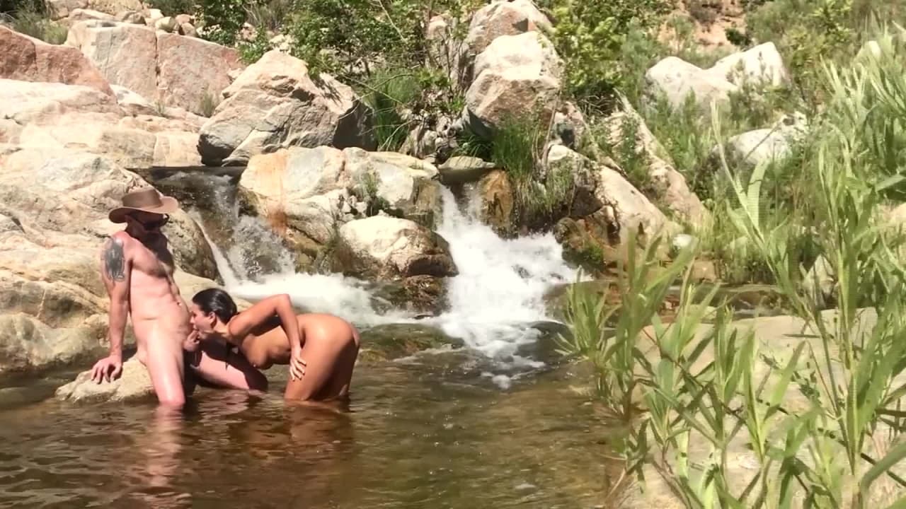 Adriana Chechik gives a sloppy blowjob outdoors