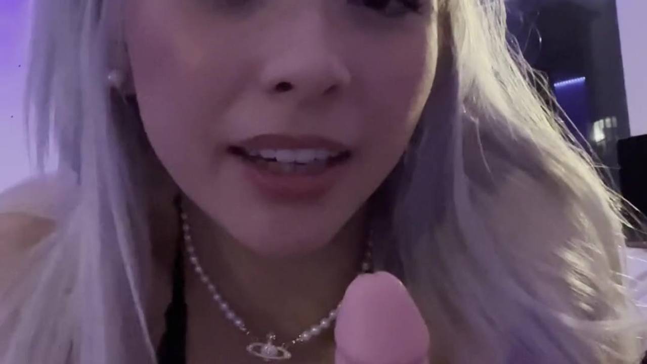 This adorable blonde teen sucks on a dildo