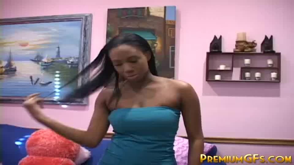 A young black babe gives head and tit wanks