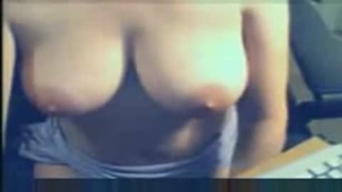 She caresses her juicy tits on camera