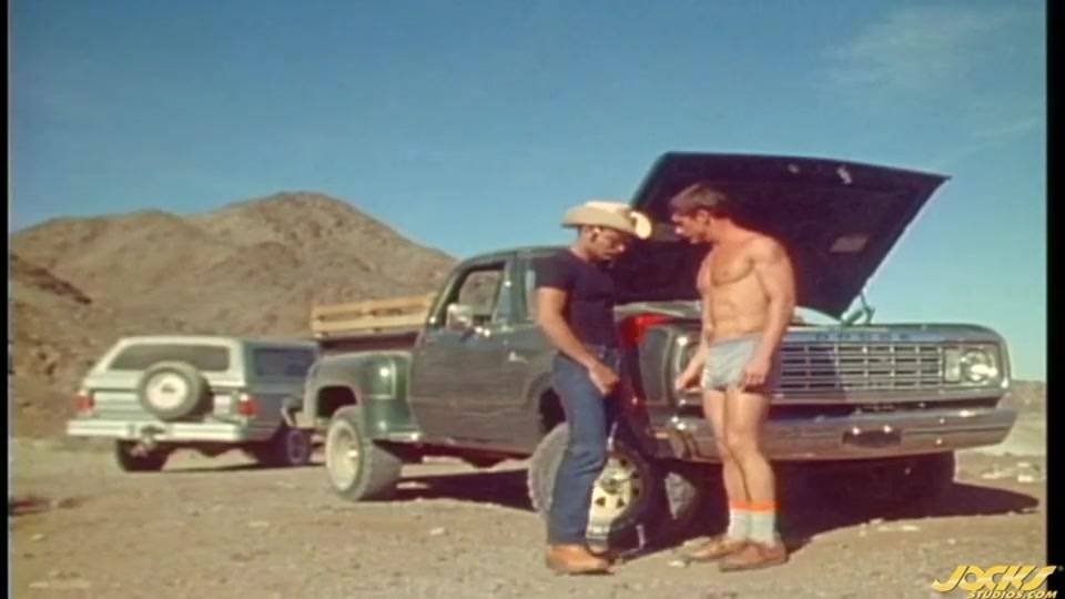 Two cowboys in the dessert having sex