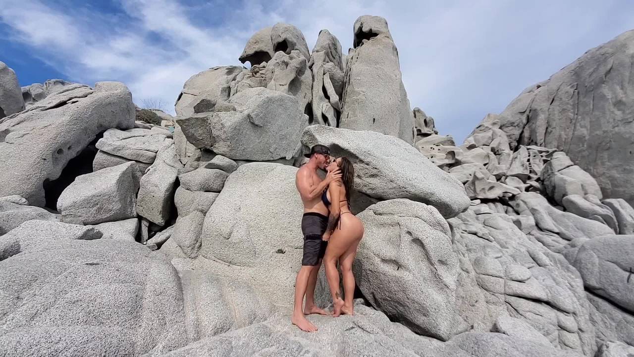 Couple has sex on an empty beach