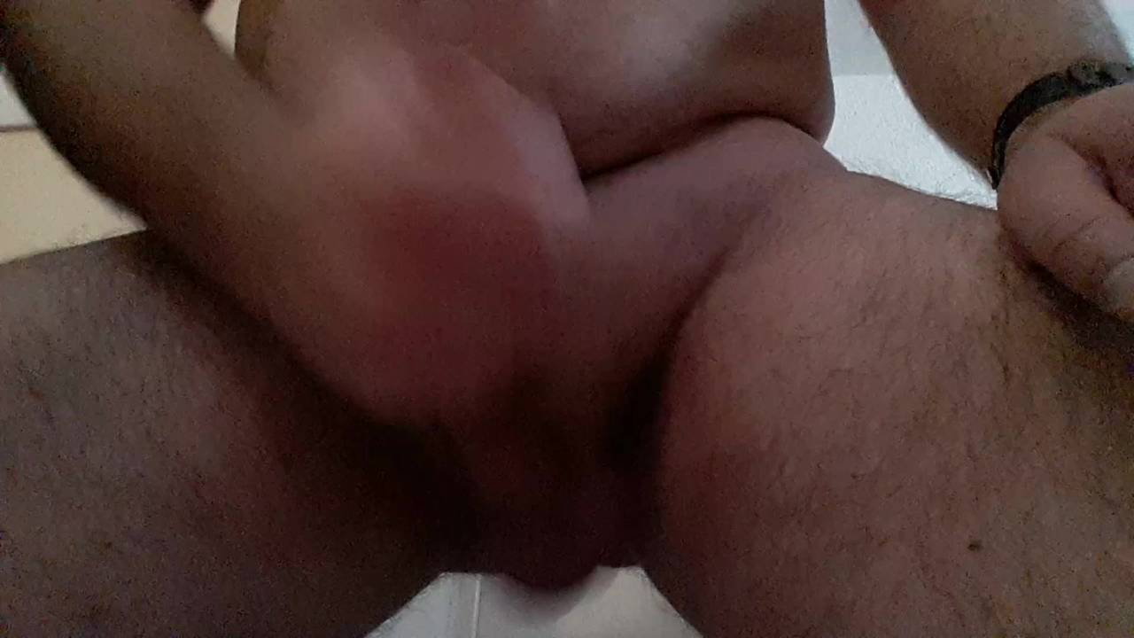 Giving himself a soaped up handjob to cum